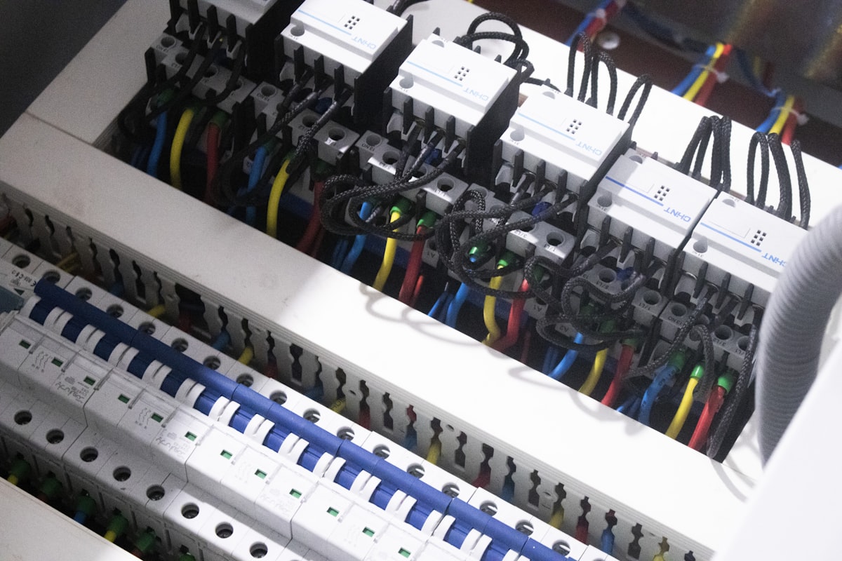Industrial distribution panel with contactors, MCBs, and dense wiring — the kind of installation a thermal imaging predictive maintenance routine inspects for hotspots
